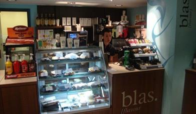 Blas at Wales National Pool Swansea counter with waiter