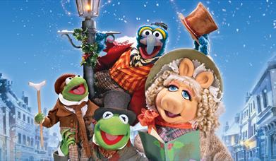 Poster for muppets christmas carol at Swansea Arena