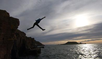 Savage Adventures coasteering jumping into water