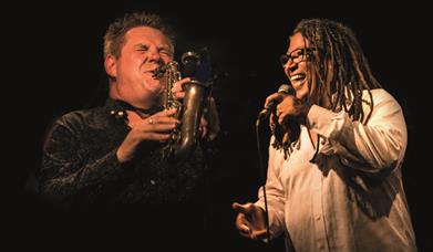 A saxophonist and a singer.