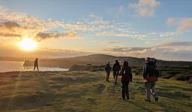 People watching the sunset at Gower Walking Festival