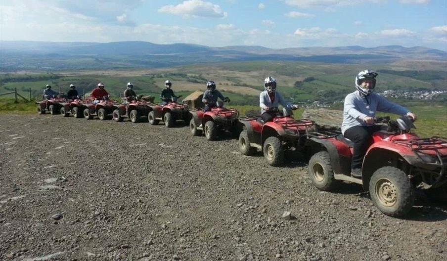 Dulais Valley Quads group of quadbikers on hill
