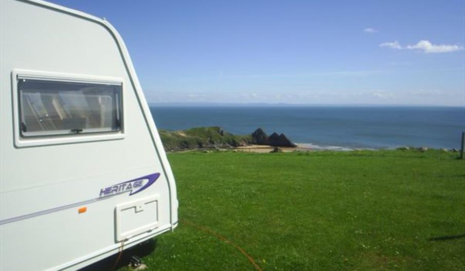 Three cliffs bay holiday park caravan on coastline