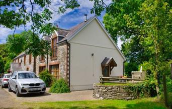 Hael Farm Cottages exterior with driveway