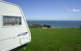 Three cliffs bay holiday park caravan on coastline
