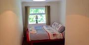 Daisys Gorgeous Fisherman_s Cottage rear bedroom