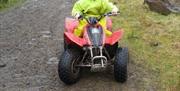 Dulais Valley Quads child on quadbike