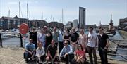 A group of people at Swansea Marina