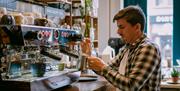 Founders & Co barista brewing coffeee