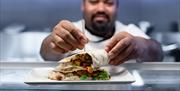 Founders & Co chef preparing food