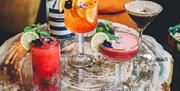 Gin and Juice table with selection of cocktails