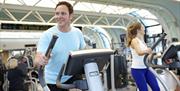 LC Swansea people on exercise machines