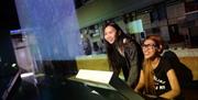 National Waterfront Museum students interacting with displays