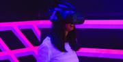 A young woman playing at Legacy VR