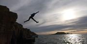 Savage Adventures coasteering jumping into water