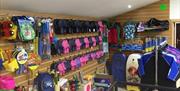 Three cliffs bay holiday park shop with water toys and floats