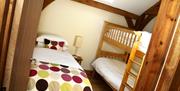 Tir-Cethin Farm Luxury Barn Holidays bedroom with bunk beds