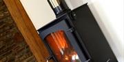 Tir-Cethin Farm Luxury Barn Holidays fireplace