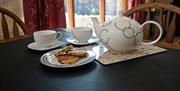 Tyn Cellar Farm Holiday Cottages tea pot and welshcakes