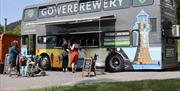 The Gower Brewery bus serving customers